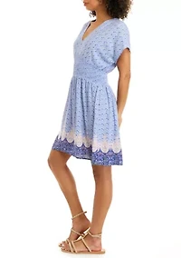 Juniors' Short Sleeve V-Neck Smocked Skater Dress