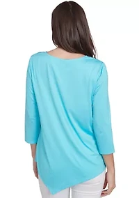 Women's Round Neck Floral Placement Printed Knit Top with Asymmetric Hem