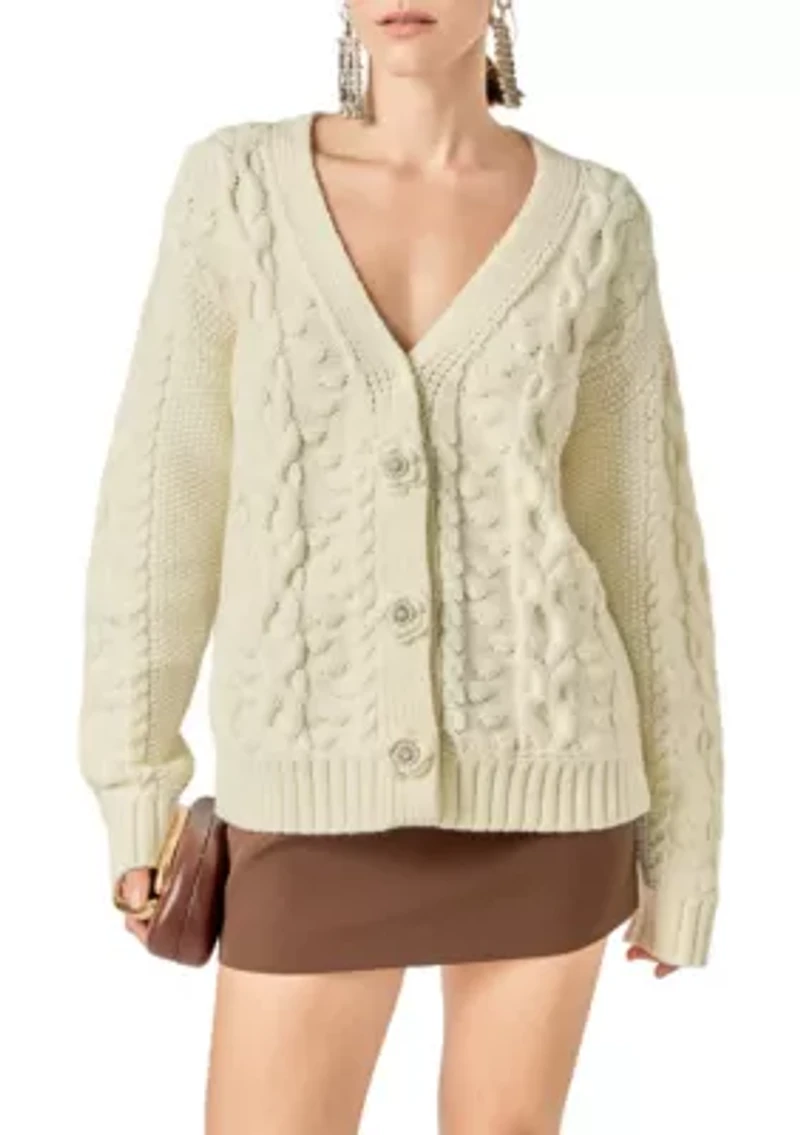 CABLE KNIT CARDIGAN WITH FLOWER DETAIL