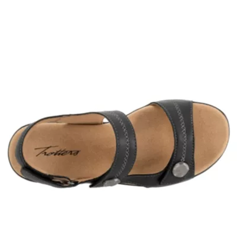 the Romi stitch sandal has everything you love (fully adjustable straps, comfortable footbed) about now with a pattern on straps topped off large ornament.