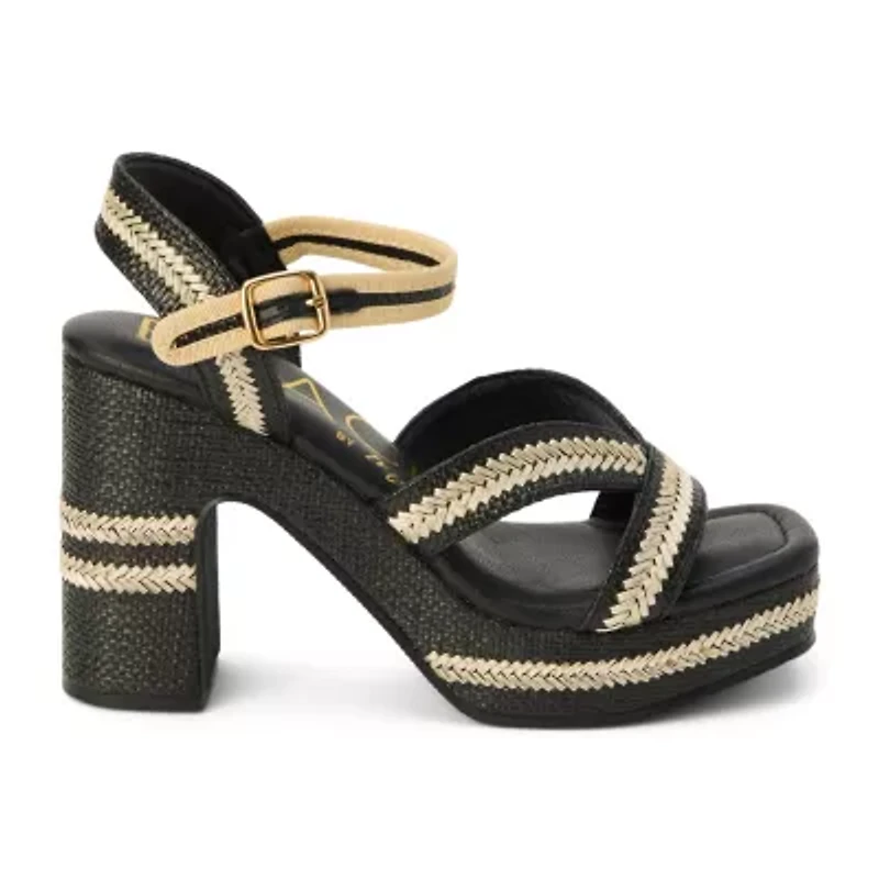 Vegan, platformed heeled sandal with ankel strap.