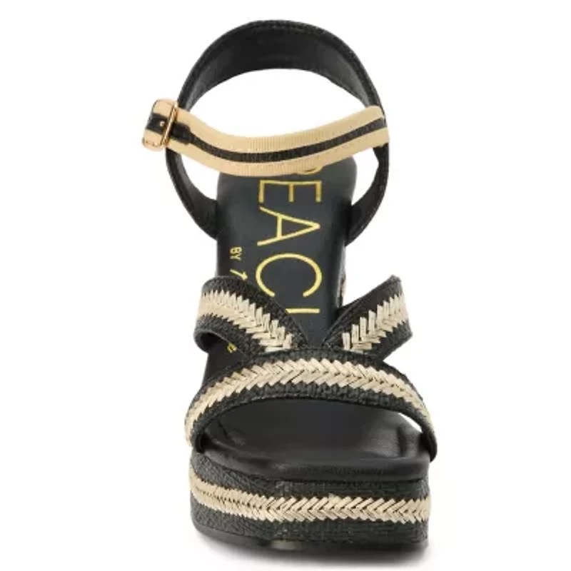 Vegan, platformed heeled sandal with ankel strap.