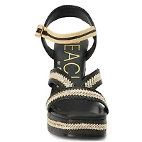 Vegan, platformed heeled sandal with ankel strap.