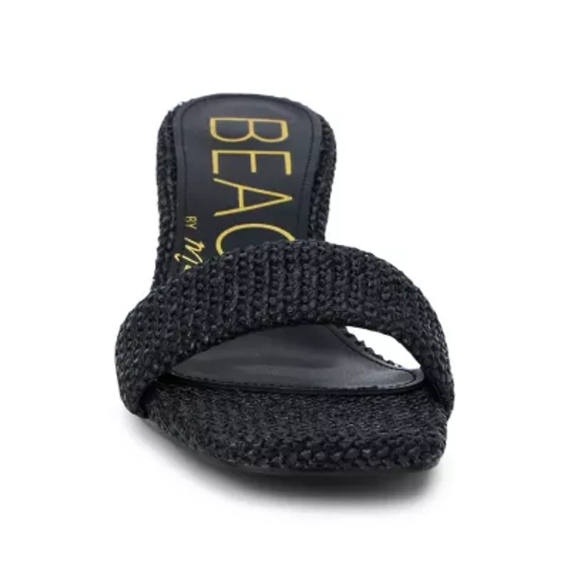 Vegan, single band Kitten heel sandal.