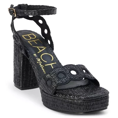 Vegan, platform heeled sandal with scallop and cut-out detail.