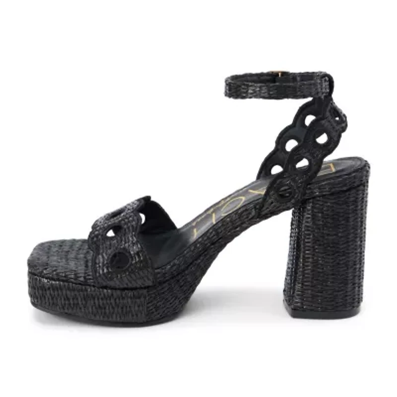 Vegan, platform heeled sandal with scallop and cut-out detail.