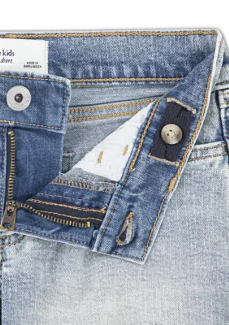 low rise midi destructed denim shorts