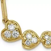 Lab Created 1/2 ct. t.w. Garnet and 1/6 ct. t.w. Lab Grown Diamond VS+ F+ Graduated Heart Necklace in 14K Yellow Gold