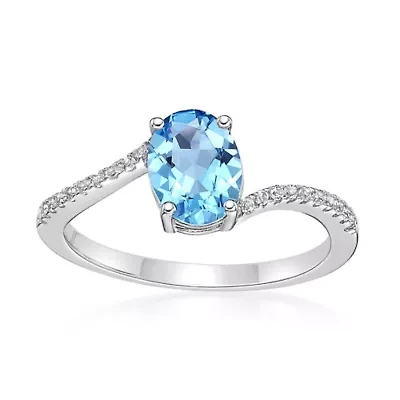 2.4 ct. t.w. ISQA Certified Blue Topaz and Created White Sapphire Ring Streling Silver