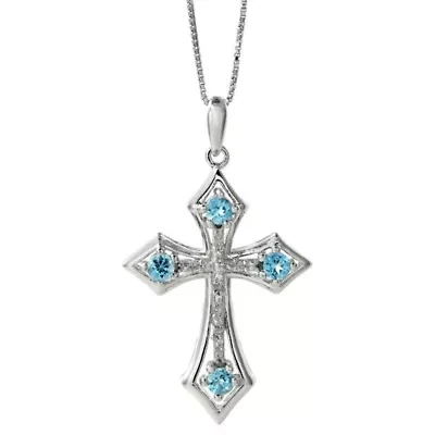 3/8 ct. t.w. Blue Topaz and Diamond Accent Cross Pendant Necklace in Sterling Silver