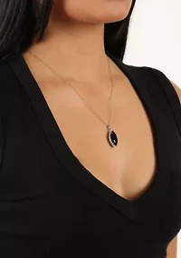 7 ct. t.w. Black Onyx and 5/8 ct. t.w. Created Whire Sapphire Pendant in Sterling Silver