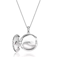 Lab Created 0.16 ct. t.w. Garnet Locket Pendant in Sterling Silver