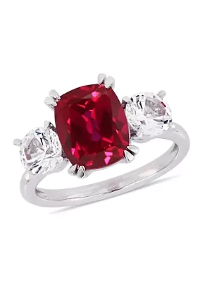 4.5 ct. t.w. Lab Created Ruby and 7/8 White Sapphire Three Stone Ring 10k Gold