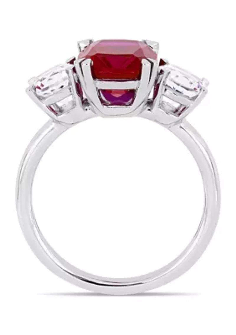 4.5 ct. t.w. Lab Created Ruby and 7/8 White Sapphire Three Stone Ring 10k Gold
