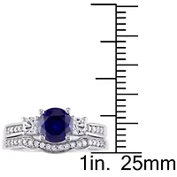 1.31 ct. t.g.w. Created Blue and White Sapphire 1/7 t.w. Diamond Bridal Ring Set 10K Gold