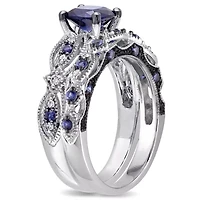 2 ct. t.g.w. Created Blue Sapphire and 1/10 t.w. Diamond Engagement Ring 10K White Gold with Black Rhodium Plated