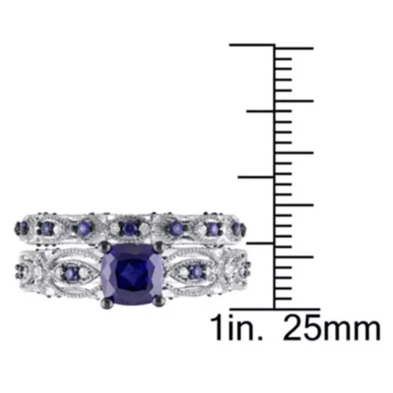2 ct. t.g.w. Created Blue Sapphire and 1/10 t.w. Diamond Engagement Ring 10K White Gold with Black Rhodium Plated