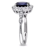 2.63 ct. t.g.w. Created Blue Sapphire, White Topaz and 1/10 t.w. Diamond Halo Ring 14K Gold