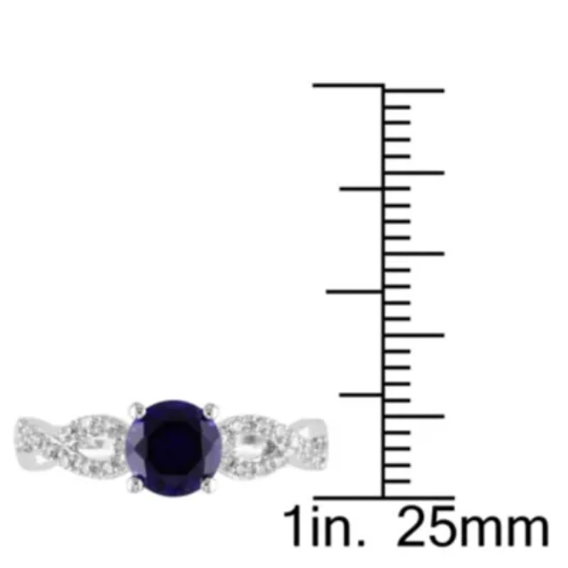 1 ct. t.g.w. Created Blue Sapphire and 1/10 t.w. Diamond Infinity Ring 10K White Gold