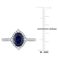 1.6 ct. t.g.w. Blue Sapphire and 1/3 t.w. Diamond Halo Engagement Ring 14K White Gold