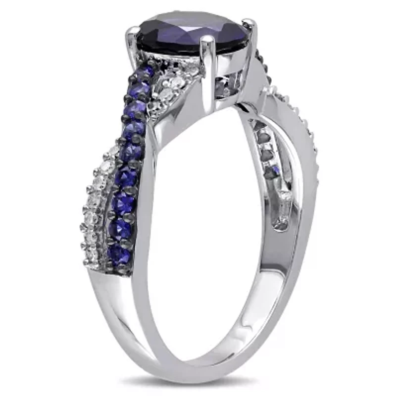 2.36 ct. t.g.w. Created Blue Sapphire and 1/10 t.w. Diamond Crossover Ring 10K White Gold Black Rhodium Plated