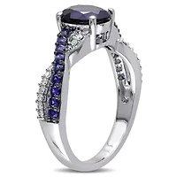 2.36 ct. t.g.w. Created Blue Sapphire and 1/10 t.w. Diamond Crossover Ring 10K White Gold Black Rhodium Plated