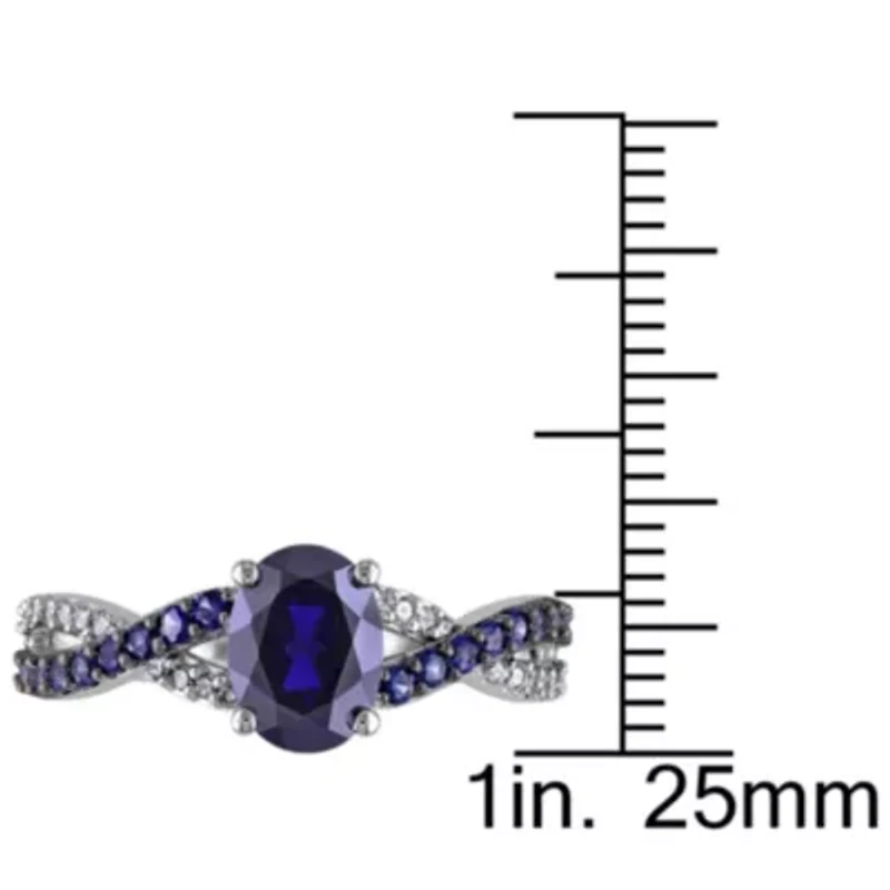 2.36 ct. t.g.w. Created Blue Sapphire and 1/10 t.w. Diamond Crossover Ring 10K White Gold Black Rhodium Plated