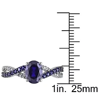 2.36 ct. t.g.w. Created Blue Sapphire and 1/10 t.w. Diamond Crossover Ring 10K White Gold Black Rhodium Plated