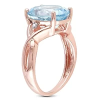5.5 ct. t.g.w. Sky Blue Topaz and 1/10 t.w. Diamond Cocktail Ring Rose Plated Sterling Silver