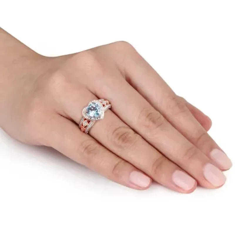 2 ct. t.g.w. Sky Blue Topaz and 1/10 t.w. Diamond Heart Ring Rose Plated Sterling Silver