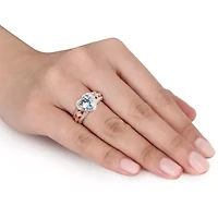 2 ct. t.g.w. Sky Blue Topaz and 1/10 t.w. Diamond Heart Ring Rose Plated Sterling Silver