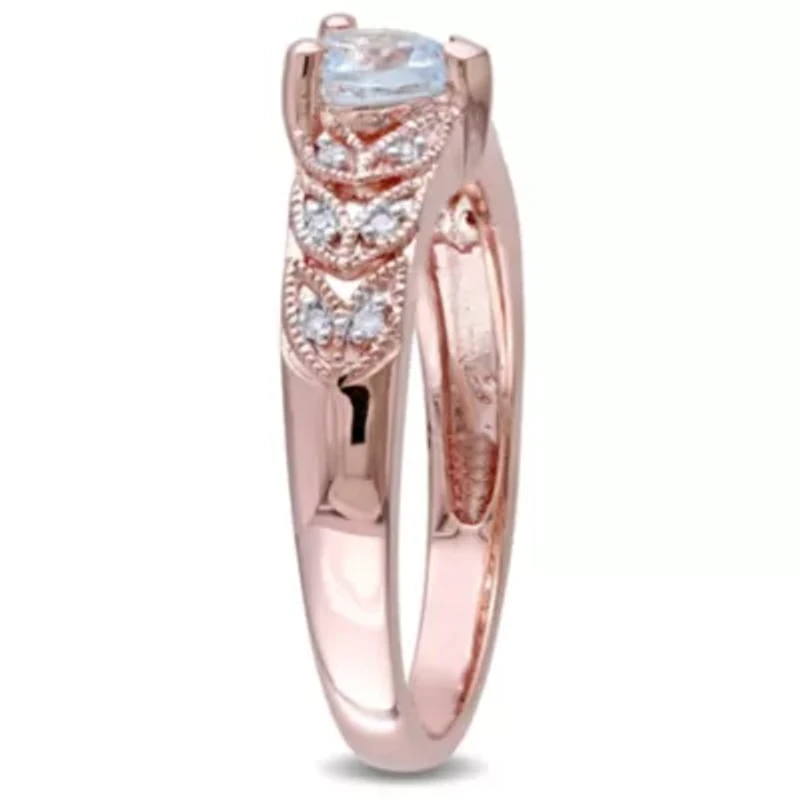 1/3 ct. t.g.w. Aquamarine and 1/10 t.w. Diamond Heart Ring Rose Plated Sterling Silver