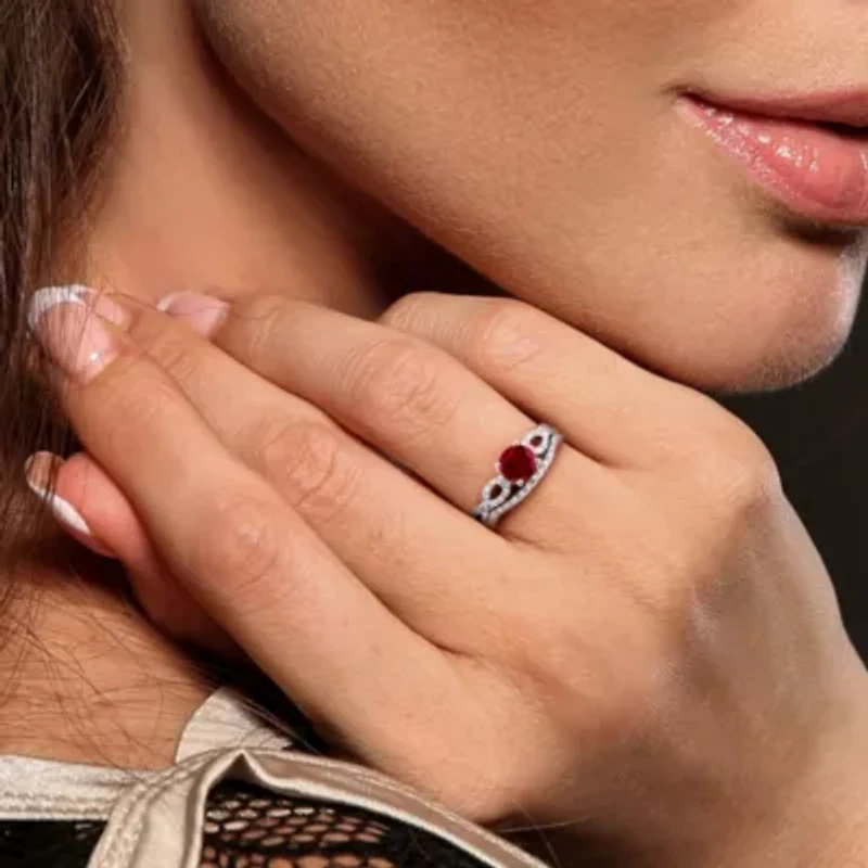 Lab Created Ruby and 1/6 ct. t.w. Diamond Infinity Bridal Ring Set 10K White Gold