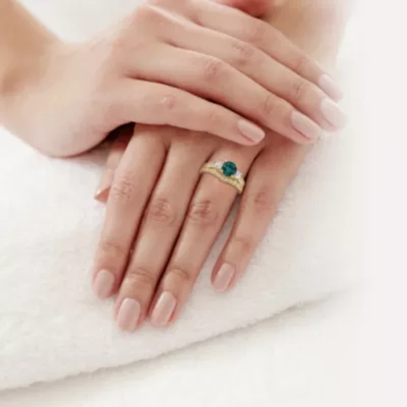Lab Created Emerald and 1/8 ct. t.w. Diamond Bridal Ring Set 10K Yellow Gold