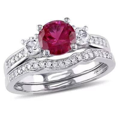 Lab Created Ruby and White Sapphire with 1/7 ct. t.w. Diamond 3-Stone Vintage Bridal Ring Set 10K Gold