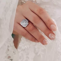 3/8 ct. t.w. Diamond Quad Halo Bridal Ring Set Sterling Silver