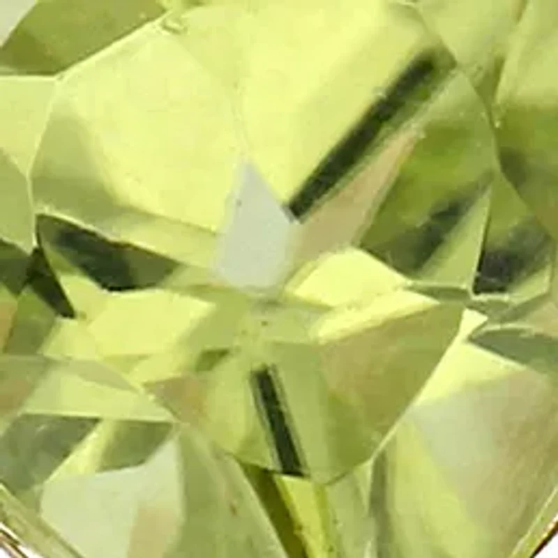 1/2 ct. t.w. Peridot and 0.06 Diamond Halo Heart Ring 10k Yellow Gold