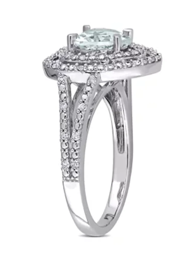 1 1/2 ct. t.w. Aquamarine and 1/5 Diamond Halo Heart Ring