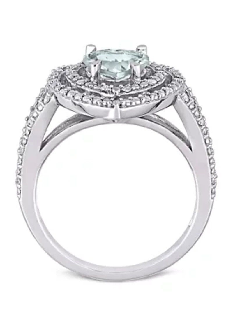 1 1/2 ct. t.w. Aquamarine and 1/5 Diamond Halo Heart Ring
