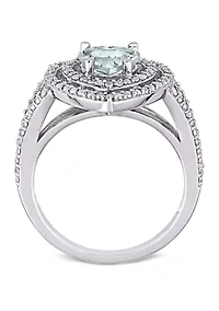 1 1/2 ct. t.w. Aquamarine and 1/5 Diamond Halo Heart Ring