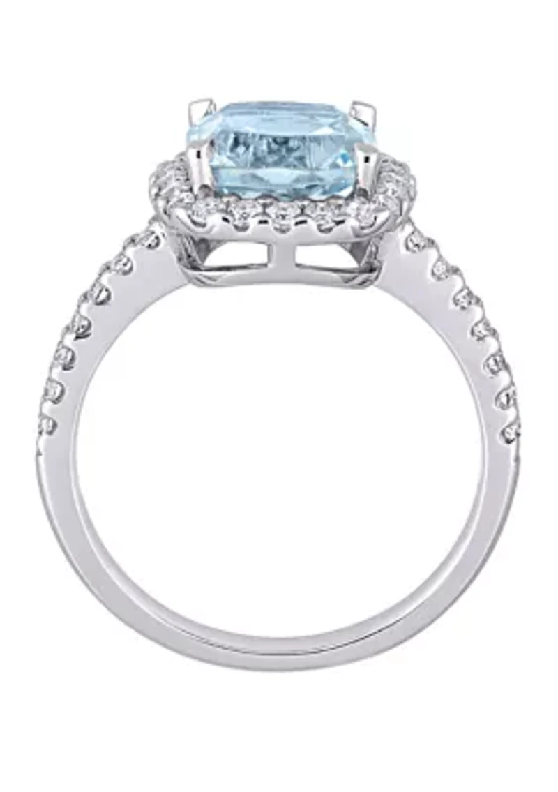 2.5 ct. t.w. Blue Topaz, 1 White Topaz Halo Ring