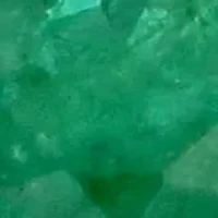Emerald and Diamond Halo Split Shank Engagement Ring