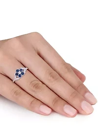 4/5 ct. t.w. Sapphire and 1/6 Diamond Floral Engagement Ring 10k White Gold