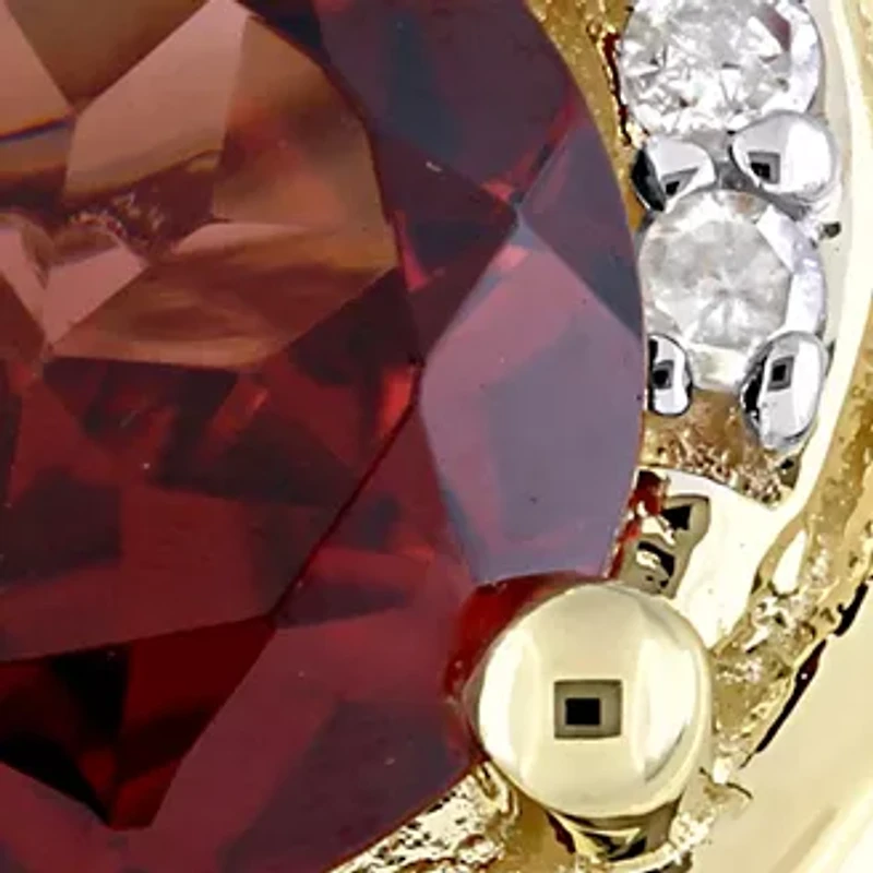 1 ct. t.w. Garnet and 1/6 Diamond Swirl Ring 10K Yellow Gold