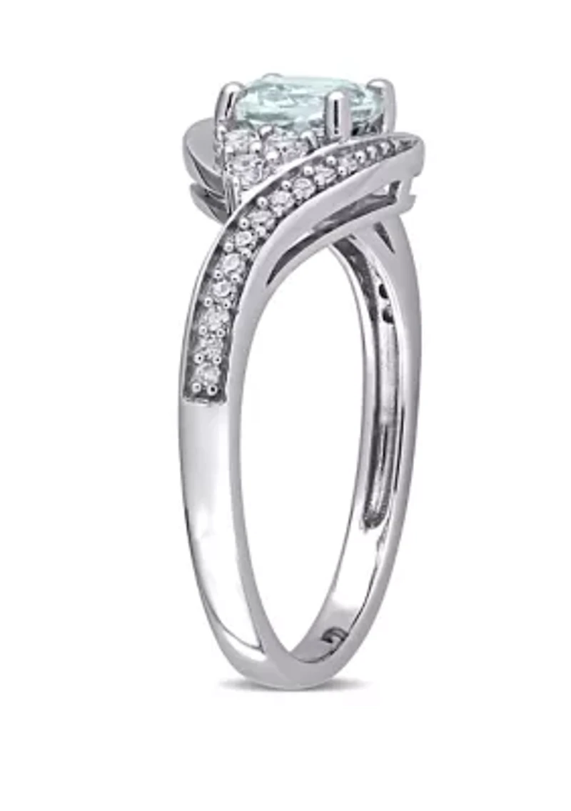 3/4 ct. t.w. Aquamarine, 1/4 White Topaz and 1/10 Diamond Swirl Ring 10k Gold