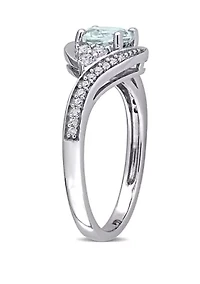 3/4 ct. t.w. Aquamarine, 1/4 White Topaz and 1/10 Diamond Swirl Ring 10k Gold