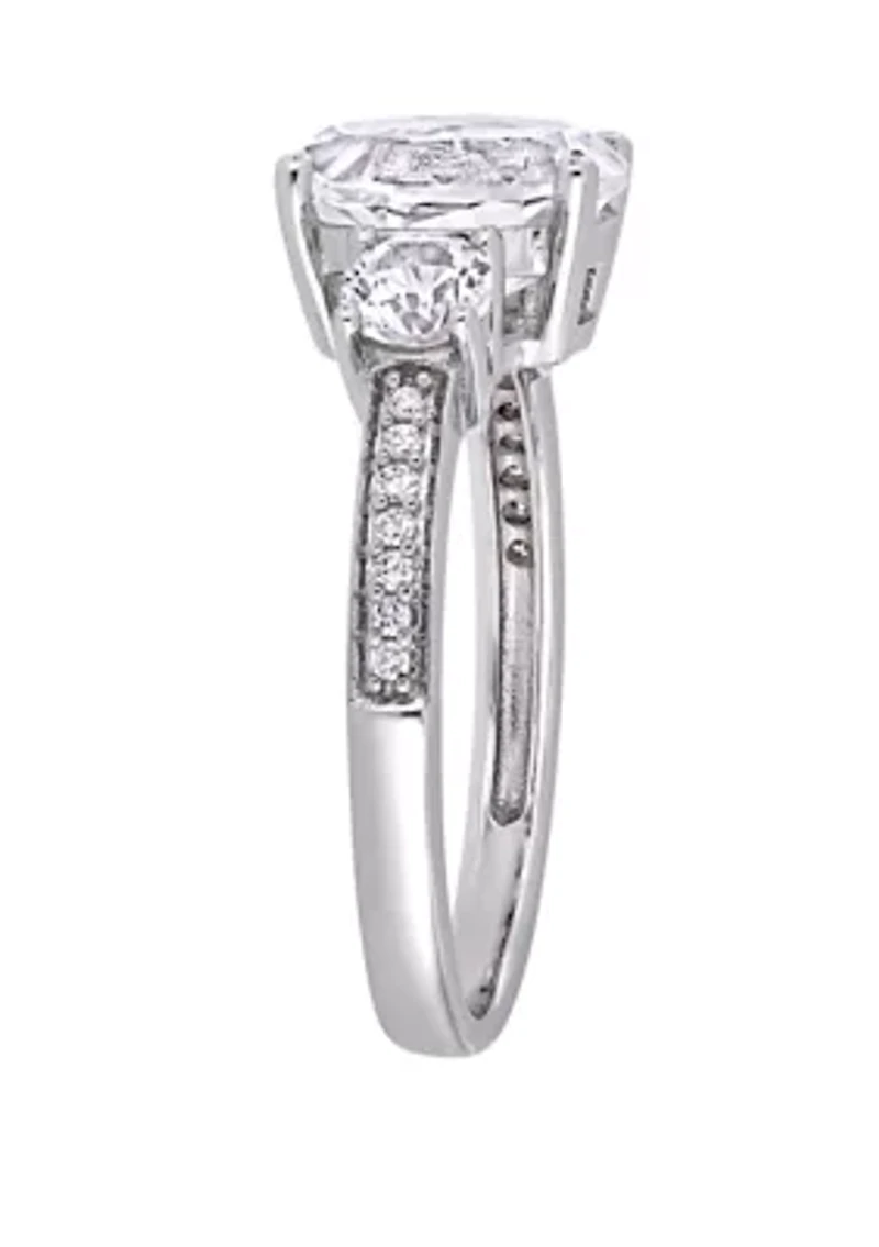 3.3 ct. t.w. Lab Created White Sapphire and 1/10 Diamond Oval 3 Stone Ring 10K Gold