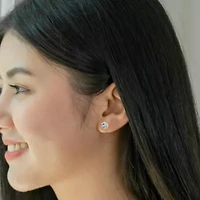 Blue Topaz & Diamond Halo Earrings in Sterling Silver