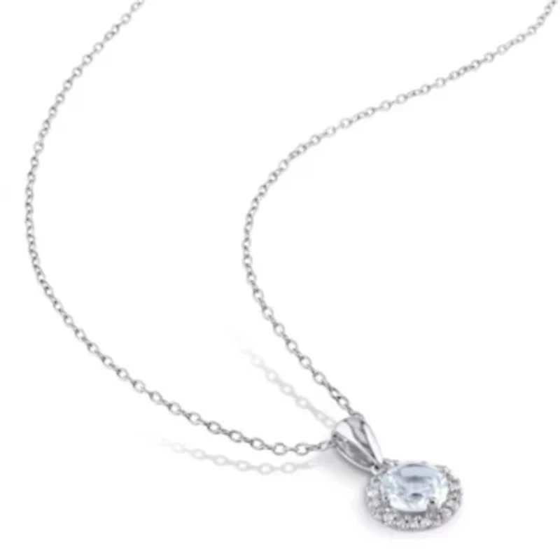 3/4 ct. t.g.w Aquamarine and 1/10 ct. t.w. Diamond Pendant with Chain in Sterling Silver
