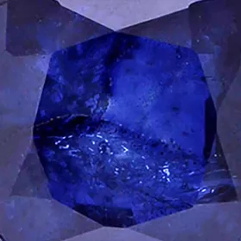 3/4 ct. t.w. Diffused Sapphire and 1/10 ct. t.w. Diamond Halo Pendant with Chain in 10k White Gold